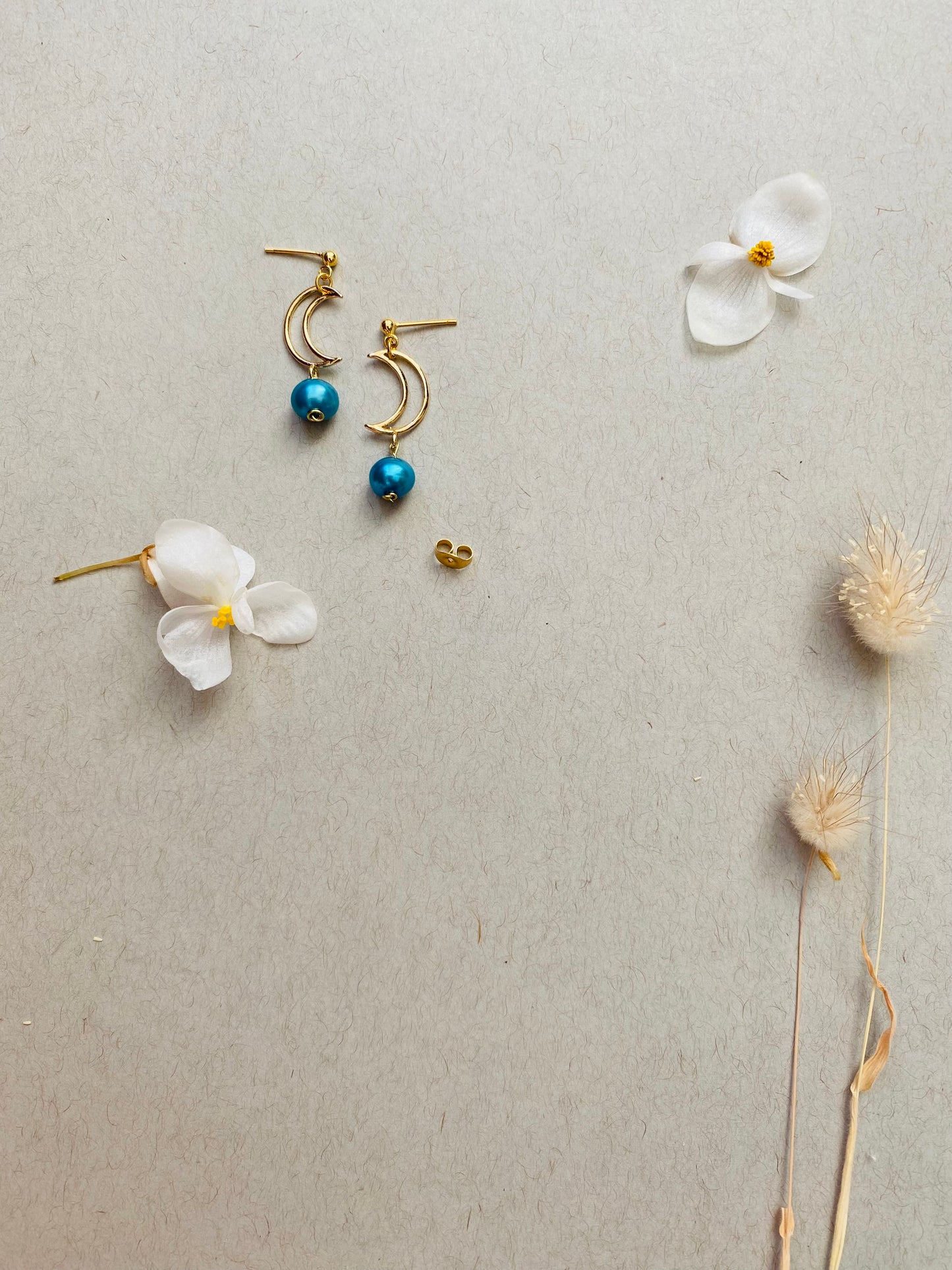 Crescent Moon earrings with blue pearls