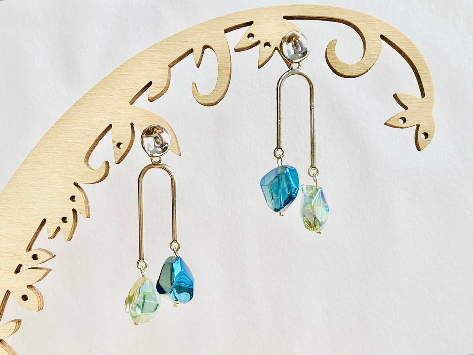 Silver plated geometric asymmetrical drip earrings with shiny unusual nugget electroplated blue / green hue glass beads
