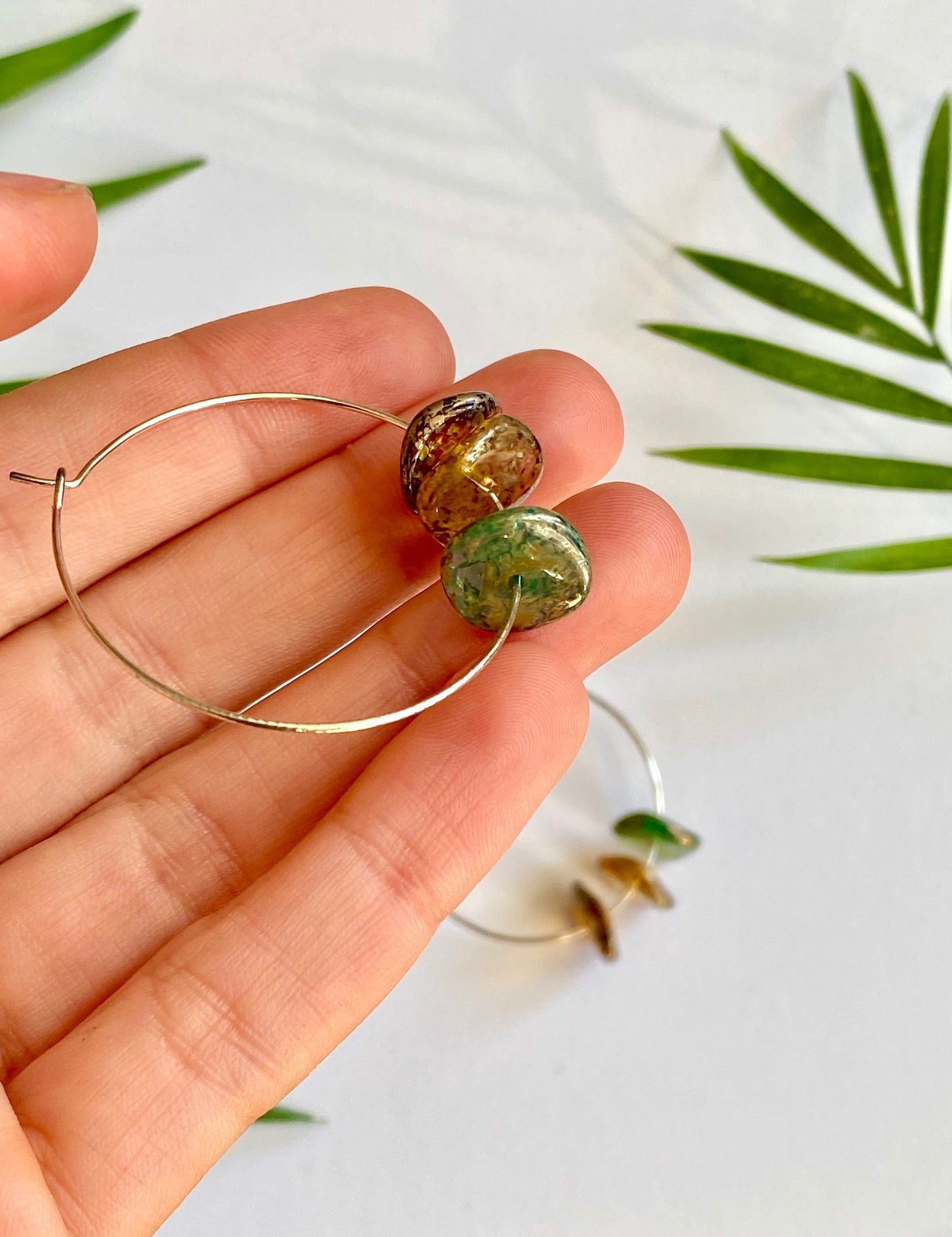 Silver hoop earrings with handmade Murano glass beads