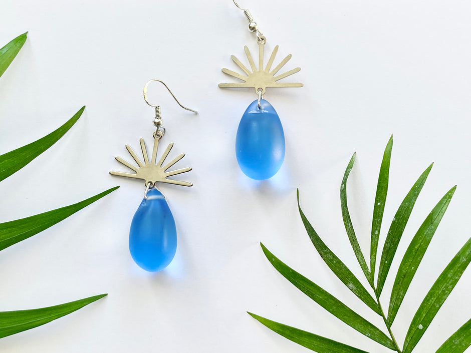 Silver Sun and Blue Glass Teardrop earrings