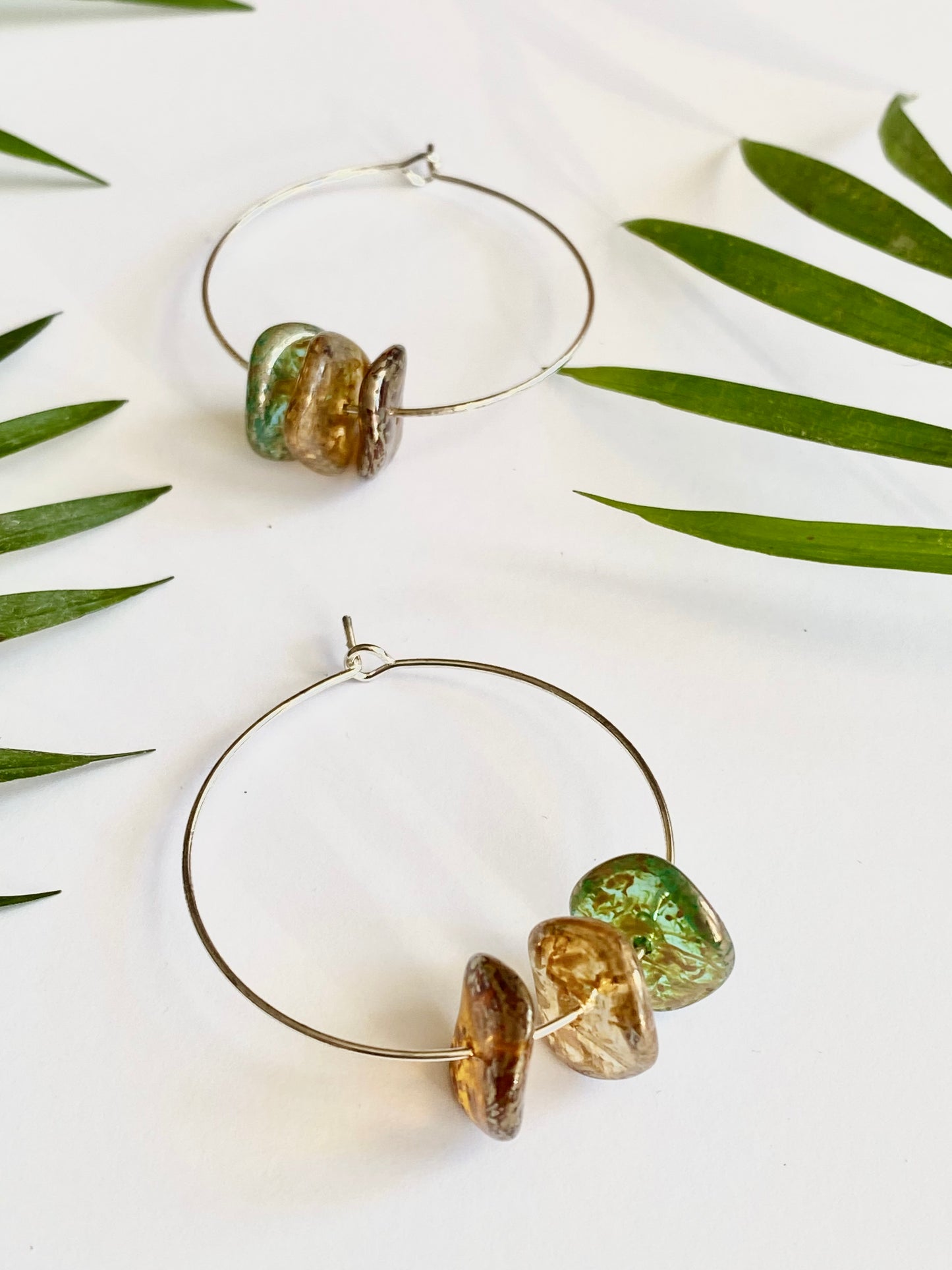 Silver hoop earrings with handmade Murano glass beads