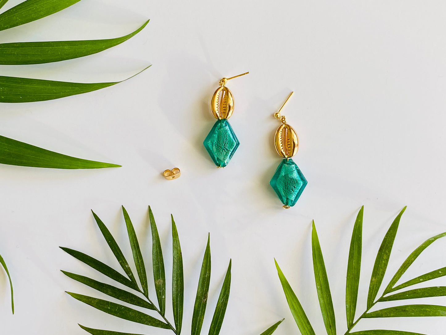 Real gold shell earrings with sparkly, turquoise green glass