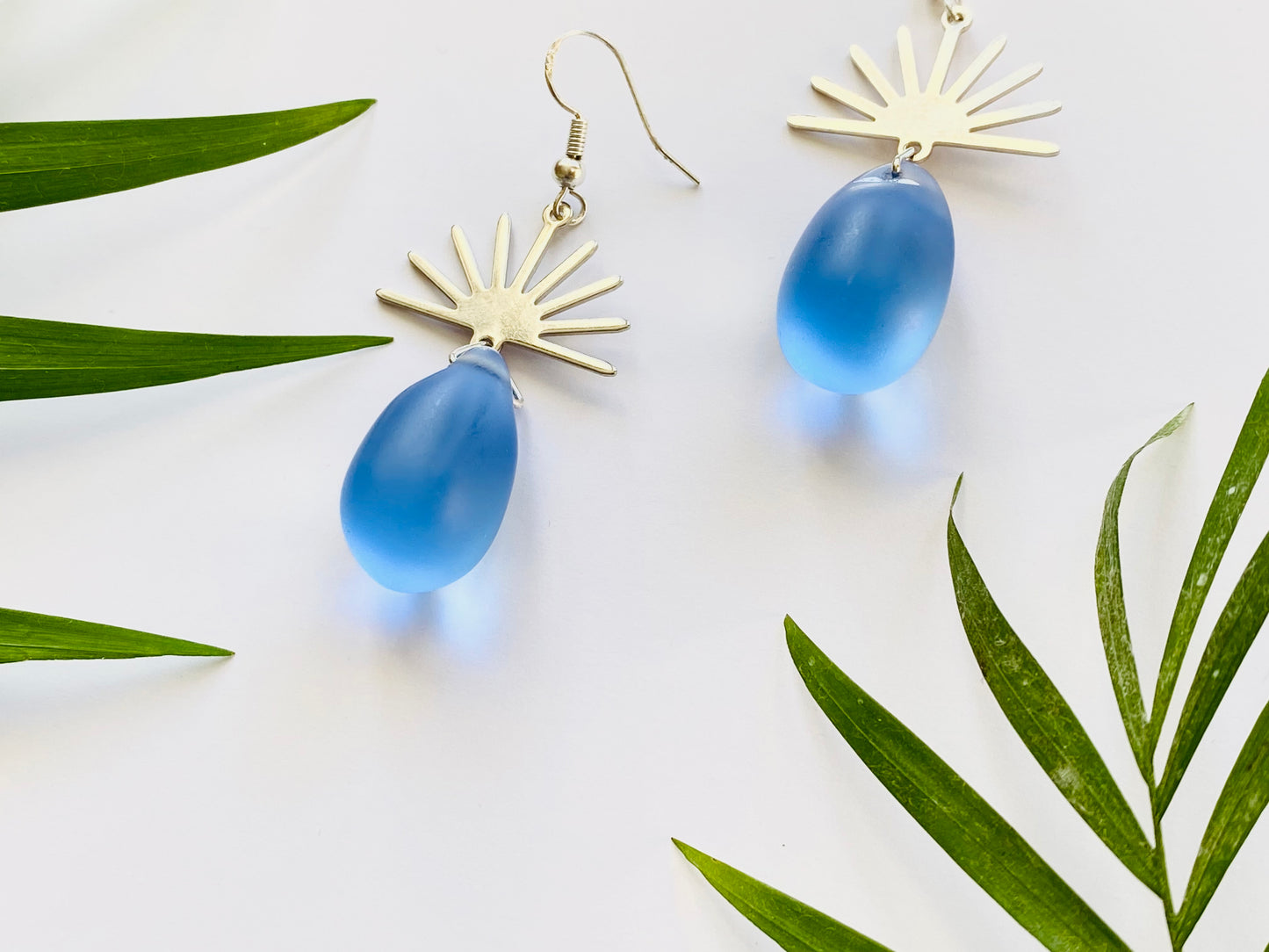 Silver Sun and Blue Glass Teardrop earrings