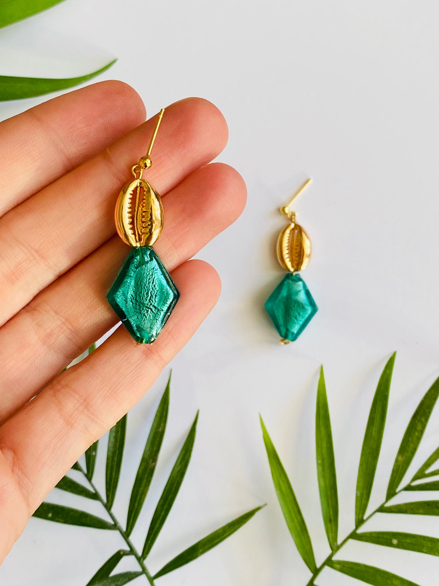 Real gold shell earrings with sparkly, turquoise green glass