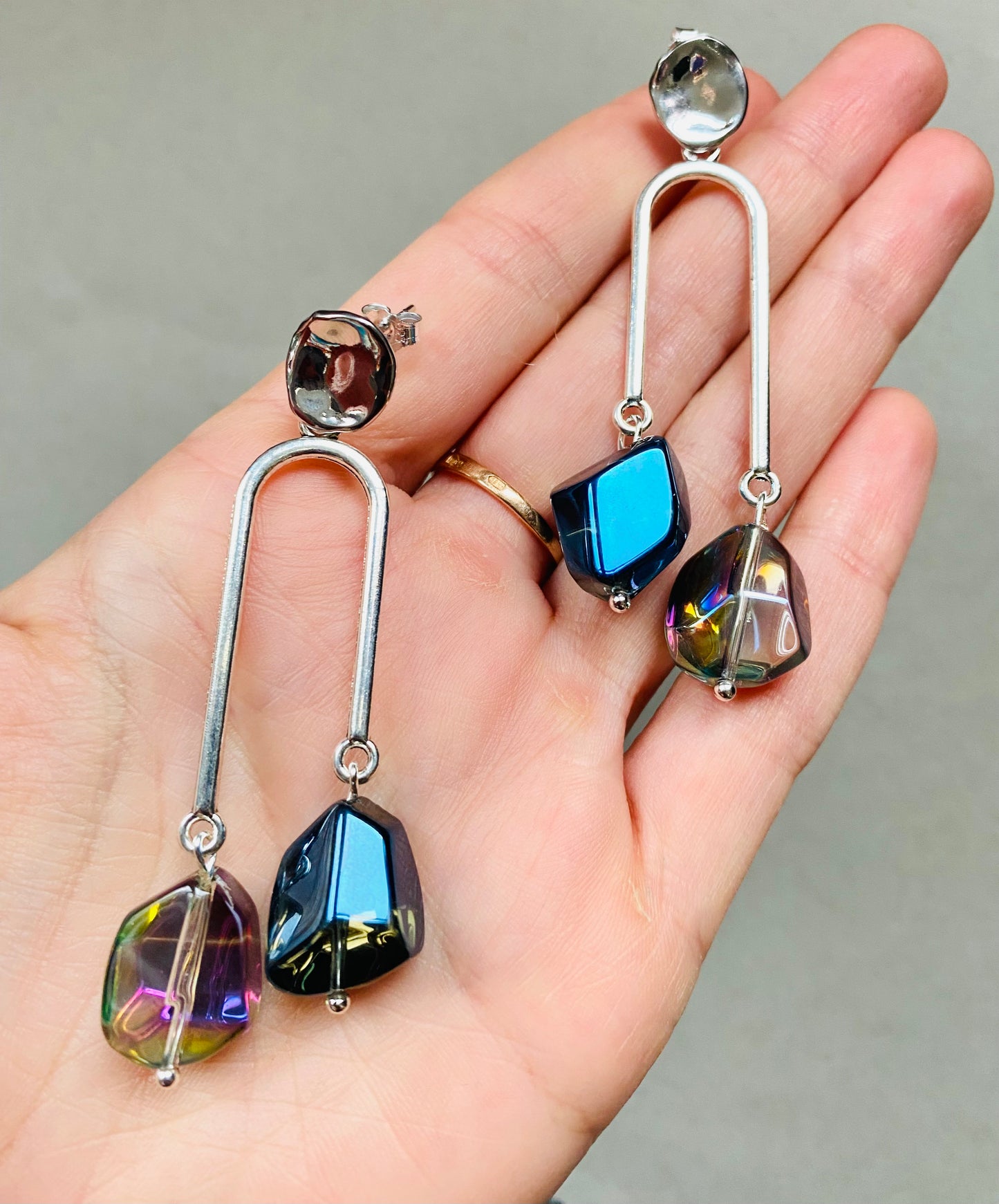 Silver plated geometric asymmetrical drip earrings with shiny unusual nugget electroplated blue / green hue glass beads