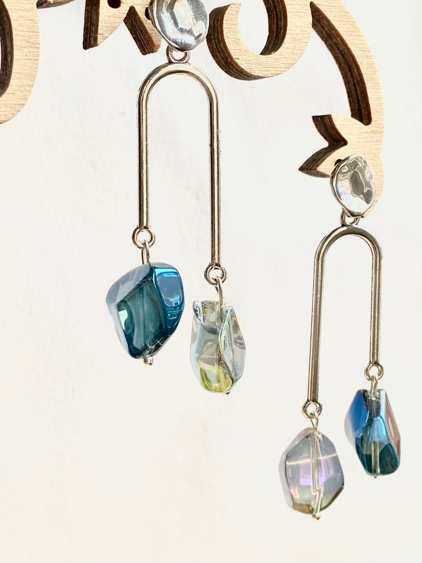 Silver plated geometric asymmetrical drip earrings with shiny unusual nugget electroplated blue / green hue glass beads