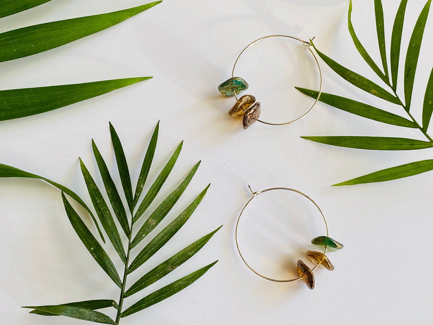 Silver hoop earrings with handmade Murano glass beads