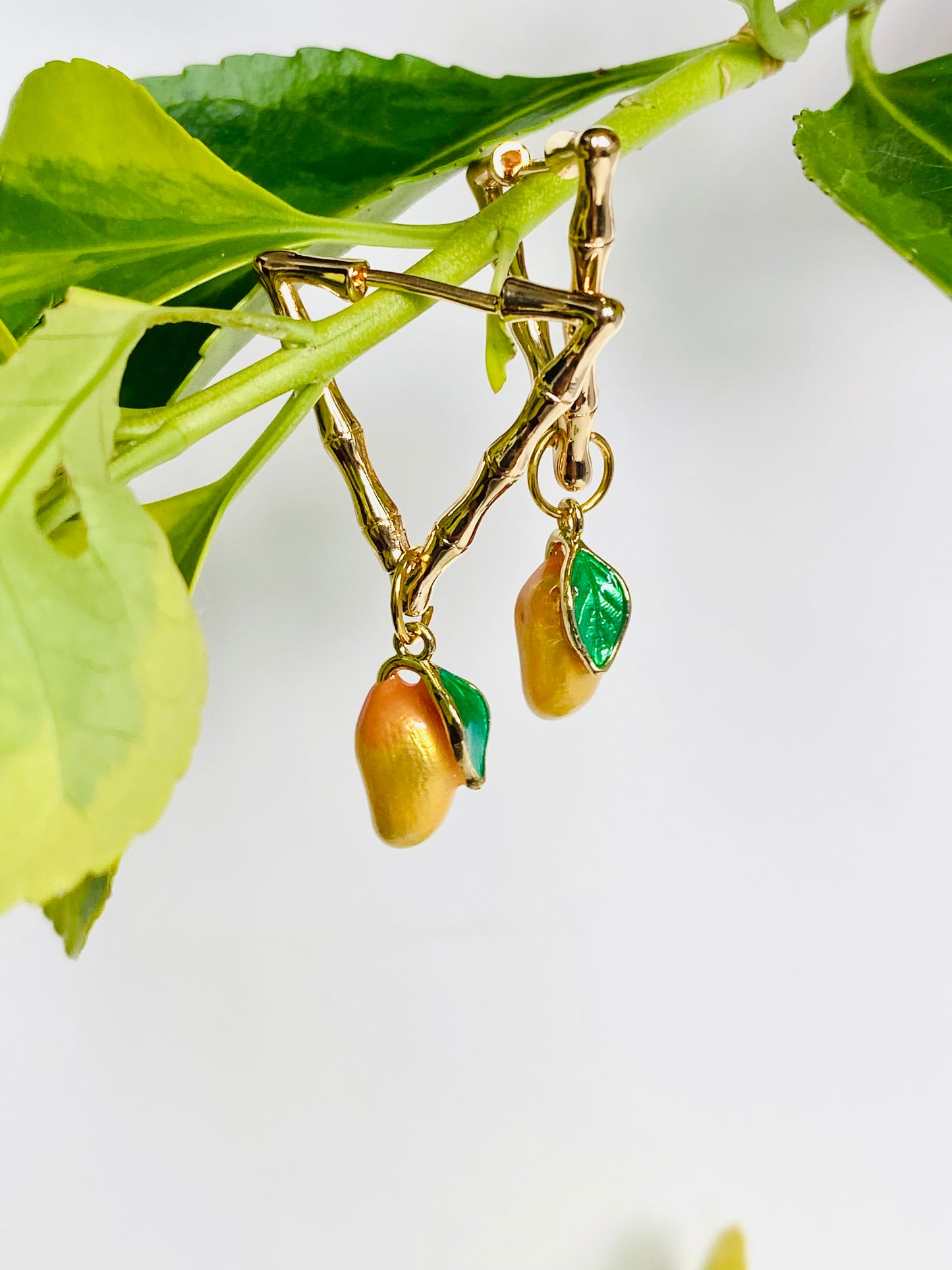 Enamelled 18kt gold plated mango fruit triangular gold bamboo earrings