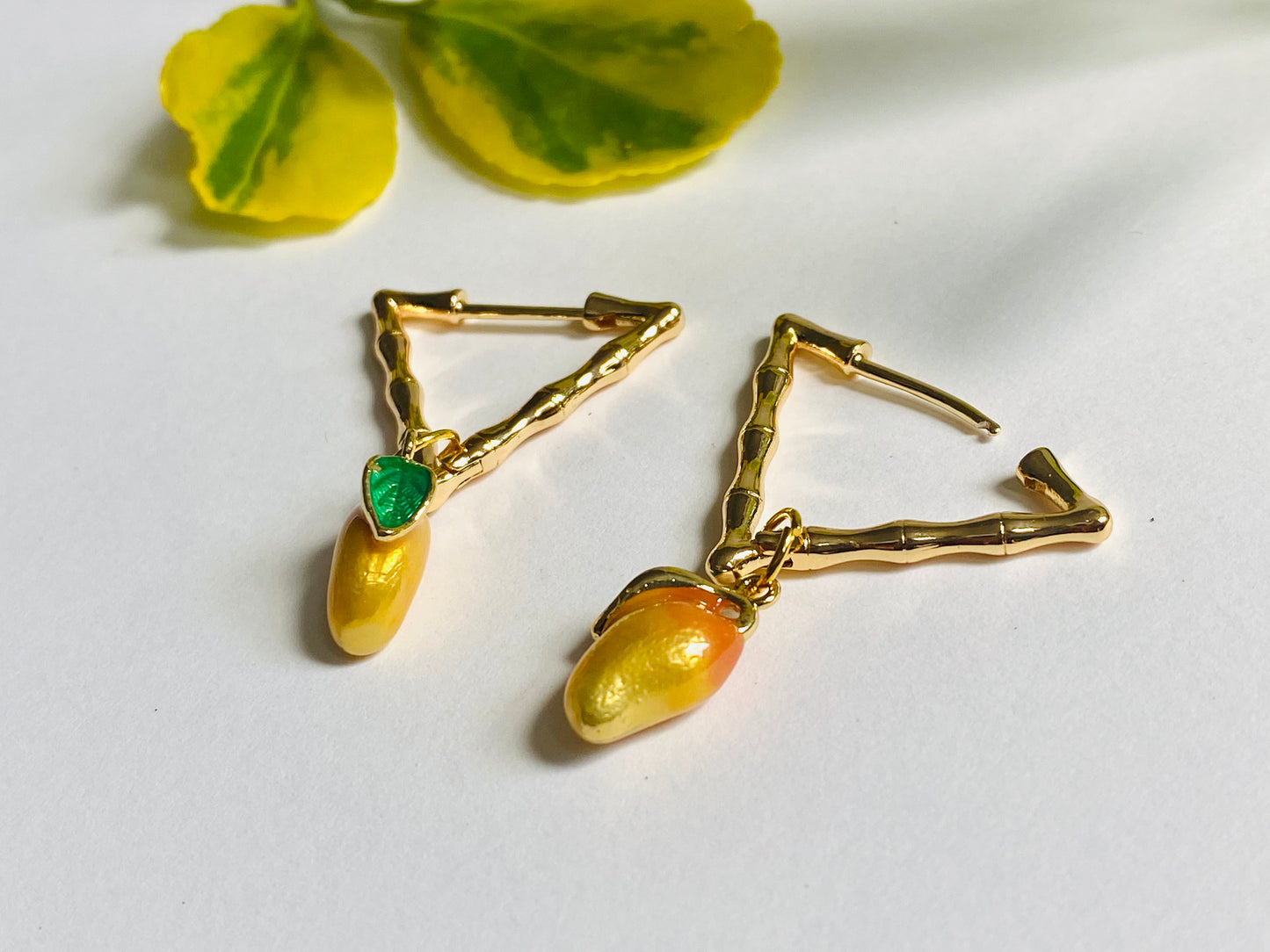 Enamelled 18kt gold plated mango fruit triangular gold bamboo earrings