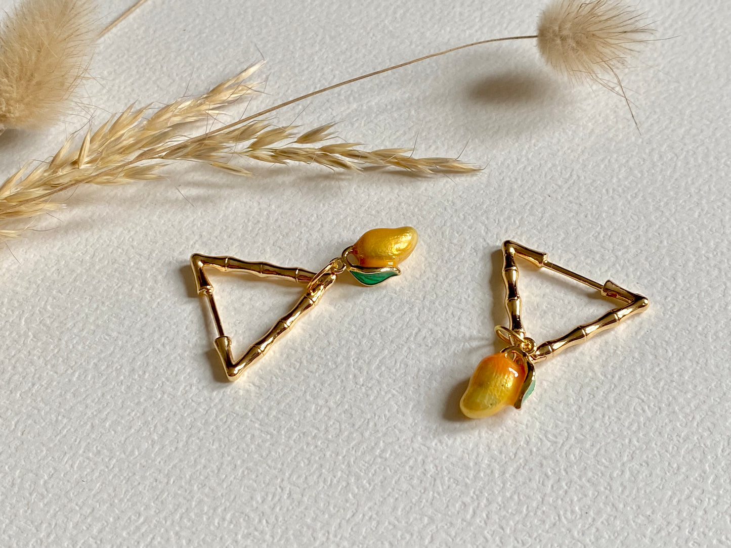 Enamelled 18kt gold plated mango fruit triangular gold bamboo earrings