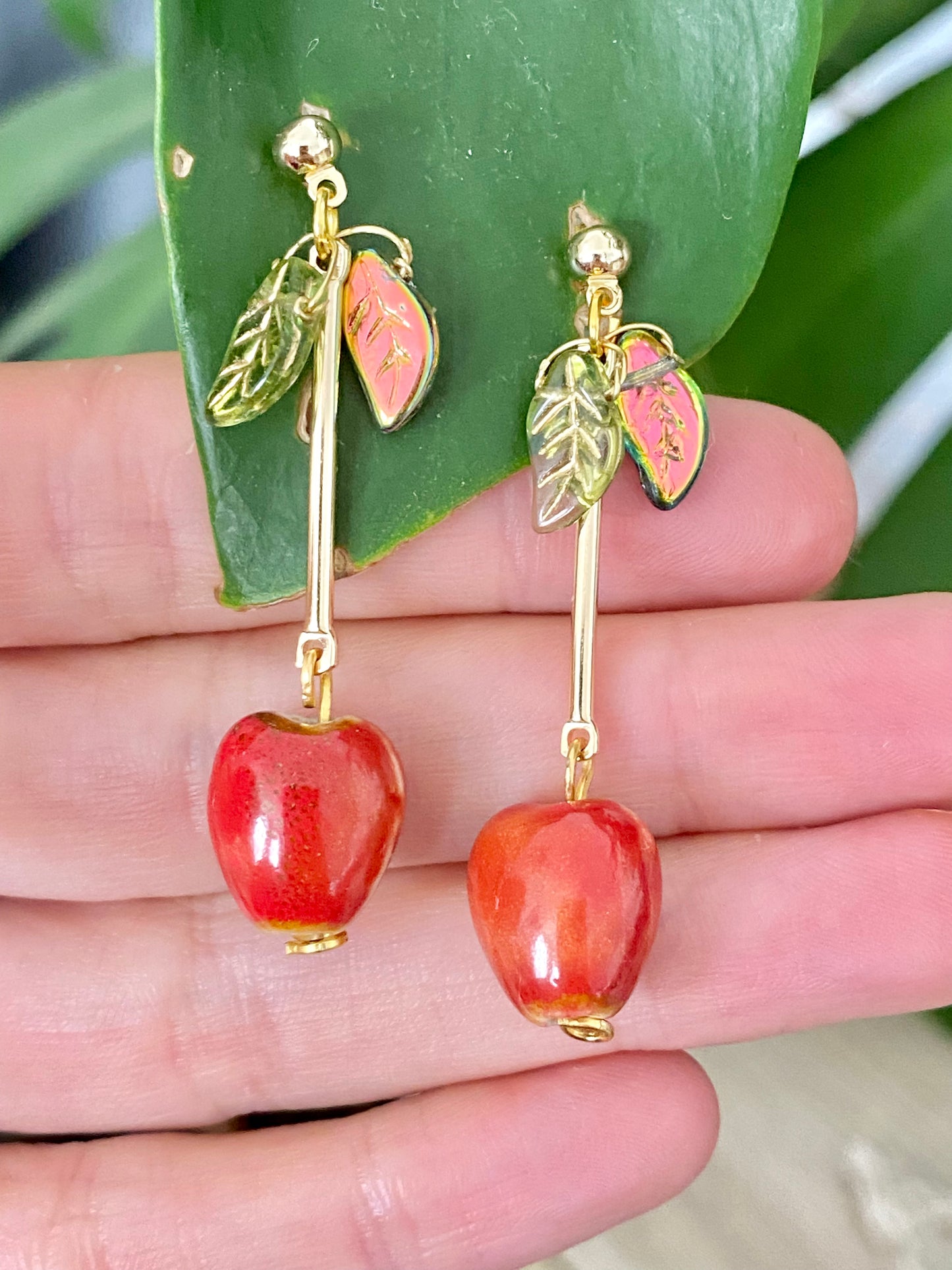 Handmade Red apple cherry fruit berry ceramic and glass drop earrings with glass leaves. Scandinavian nature inspired.