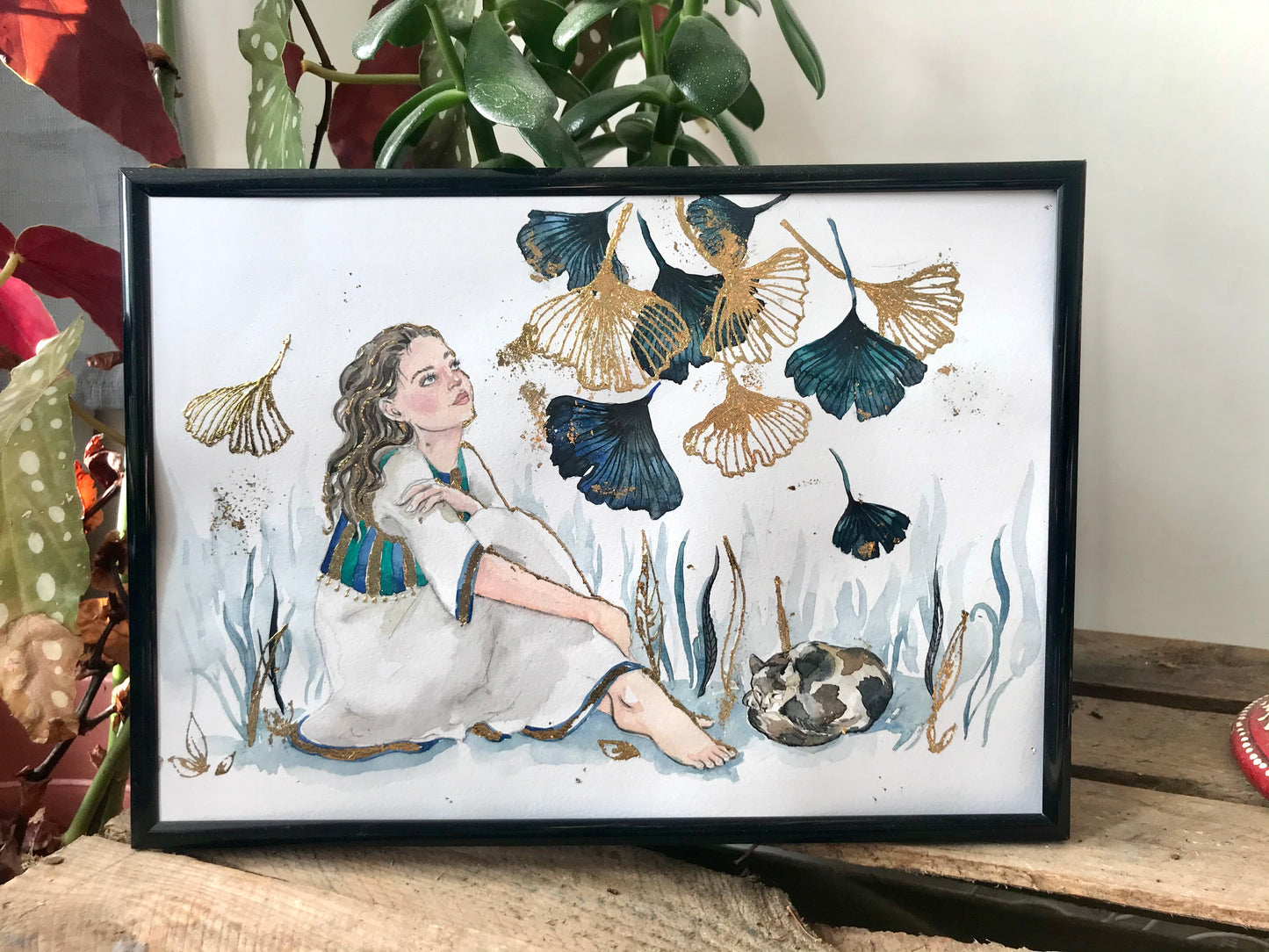 Golden Hour , original watercolor painting embellished with real gold leaf. Folktale theme of a woman , gingko leaves & cat