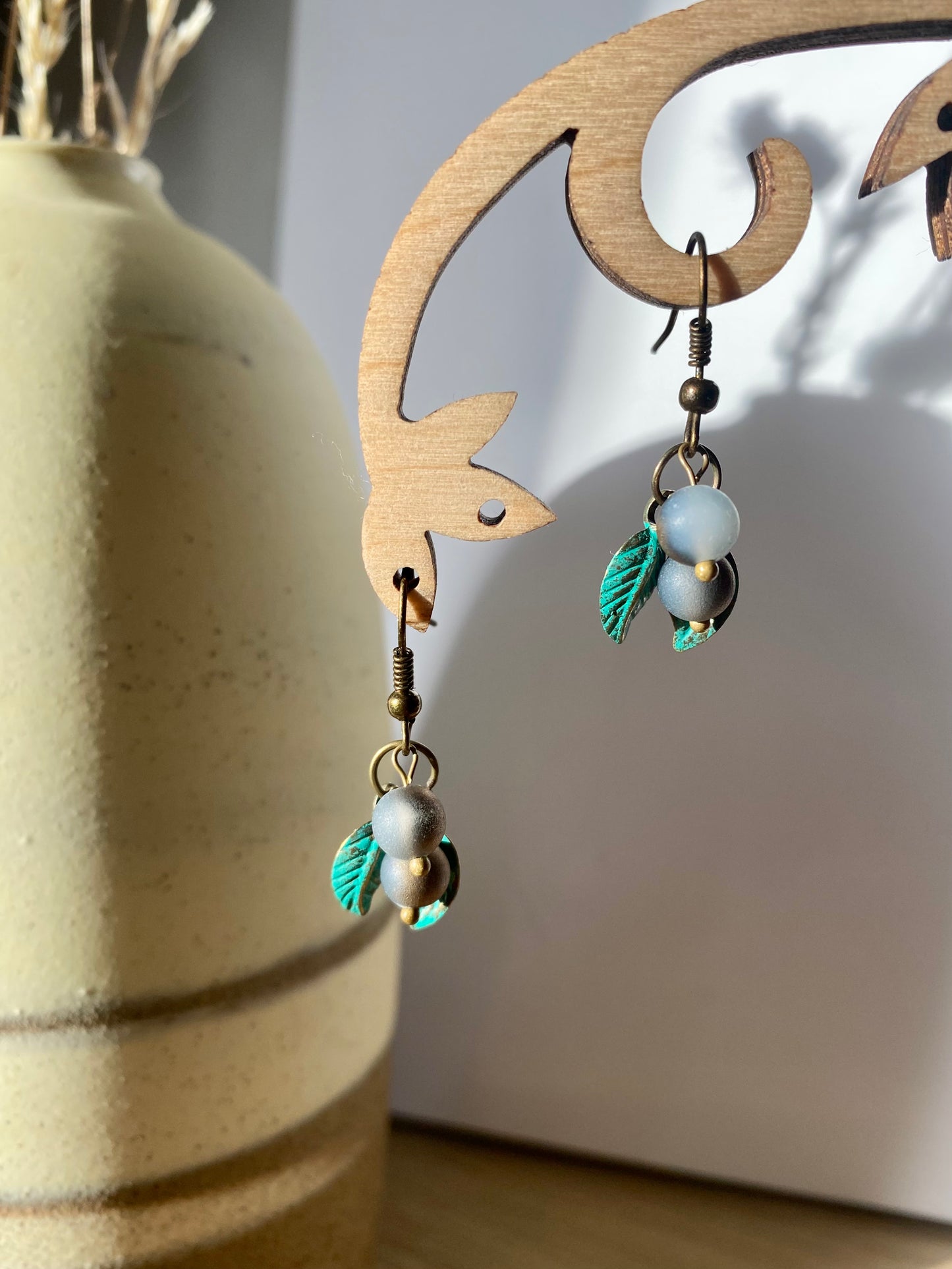 Handmade Sterling silver blueberry Druzy blue electroplated drop earrings with green leaf. Scandinavian nature inspired.