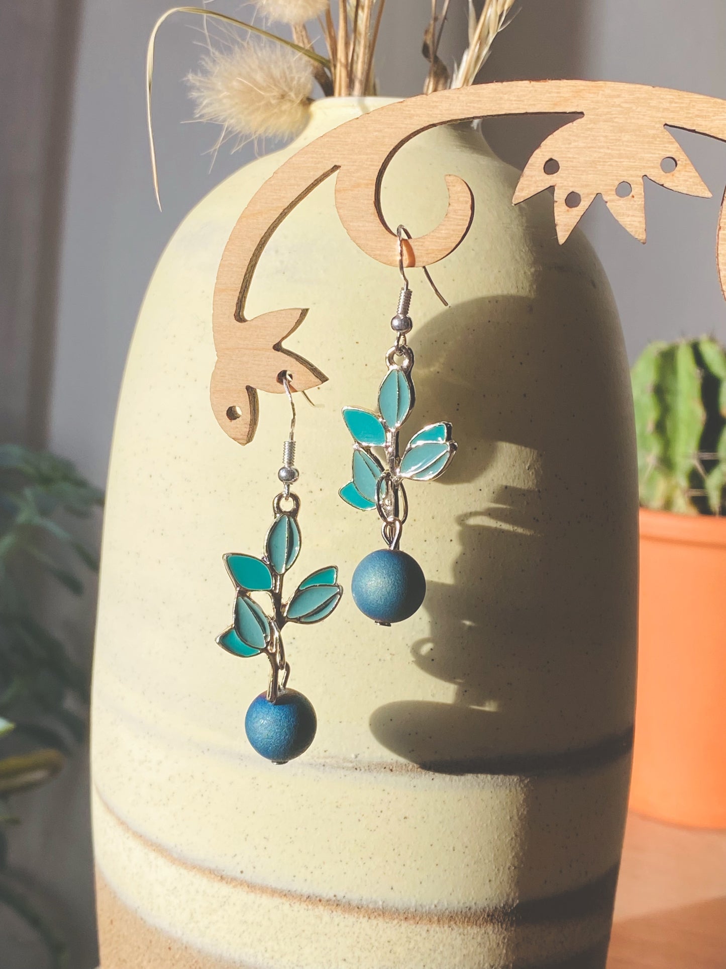 Handmade Sterling silver blueberry Druzy blue electroplated drop earrings with green leaf. Scandinavian nature inspired.